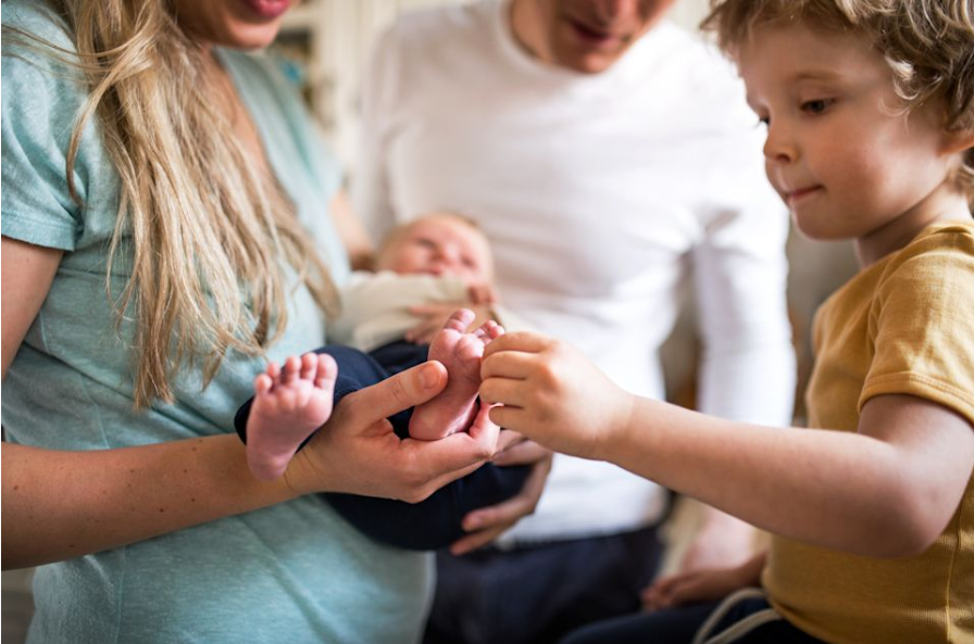 Parents and child reading together